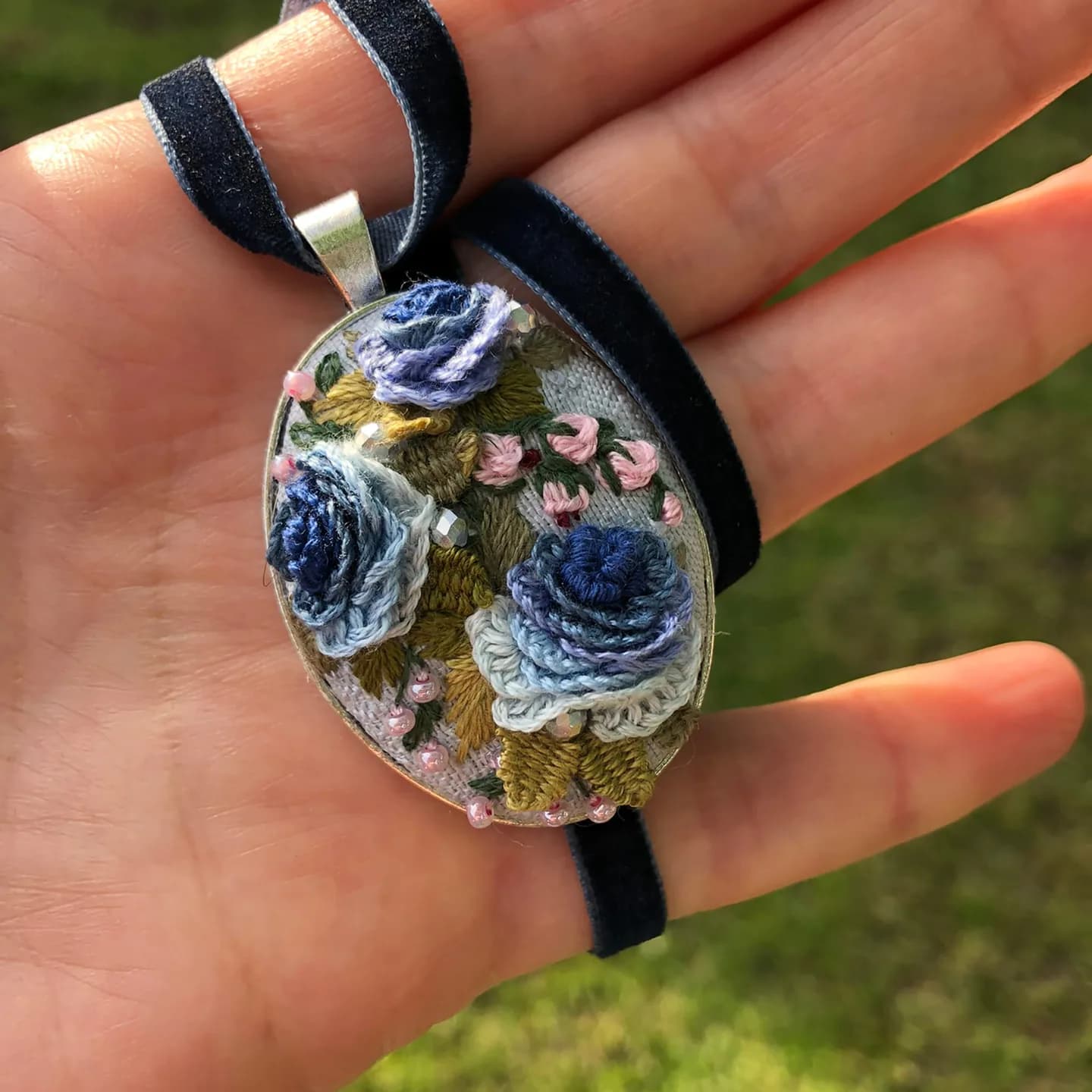 Blue Garden — pendant shown in hand, NataSko Handmade