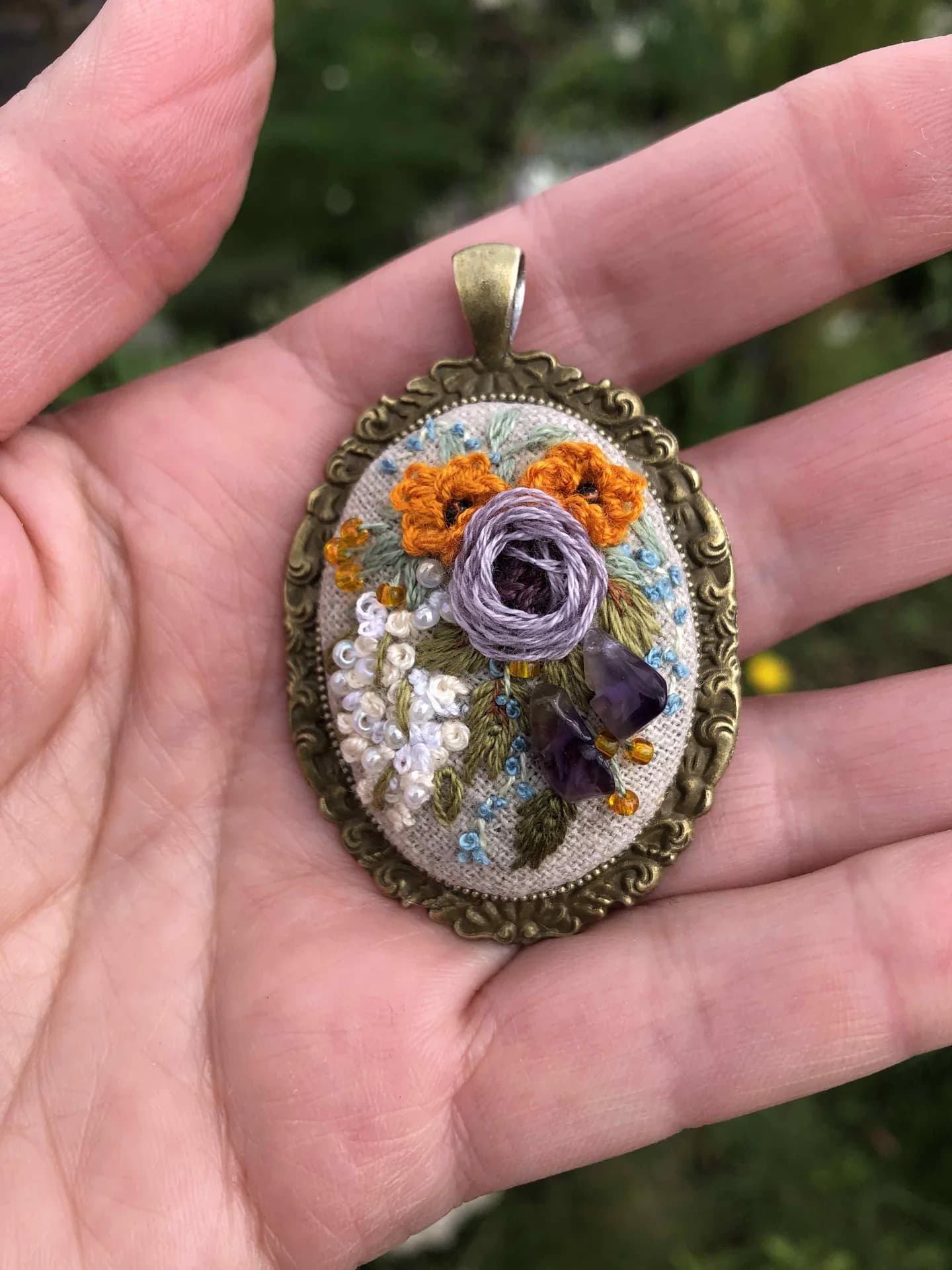 Secret Amethyst Garden — pendant shown in hand, NataSko Handmade