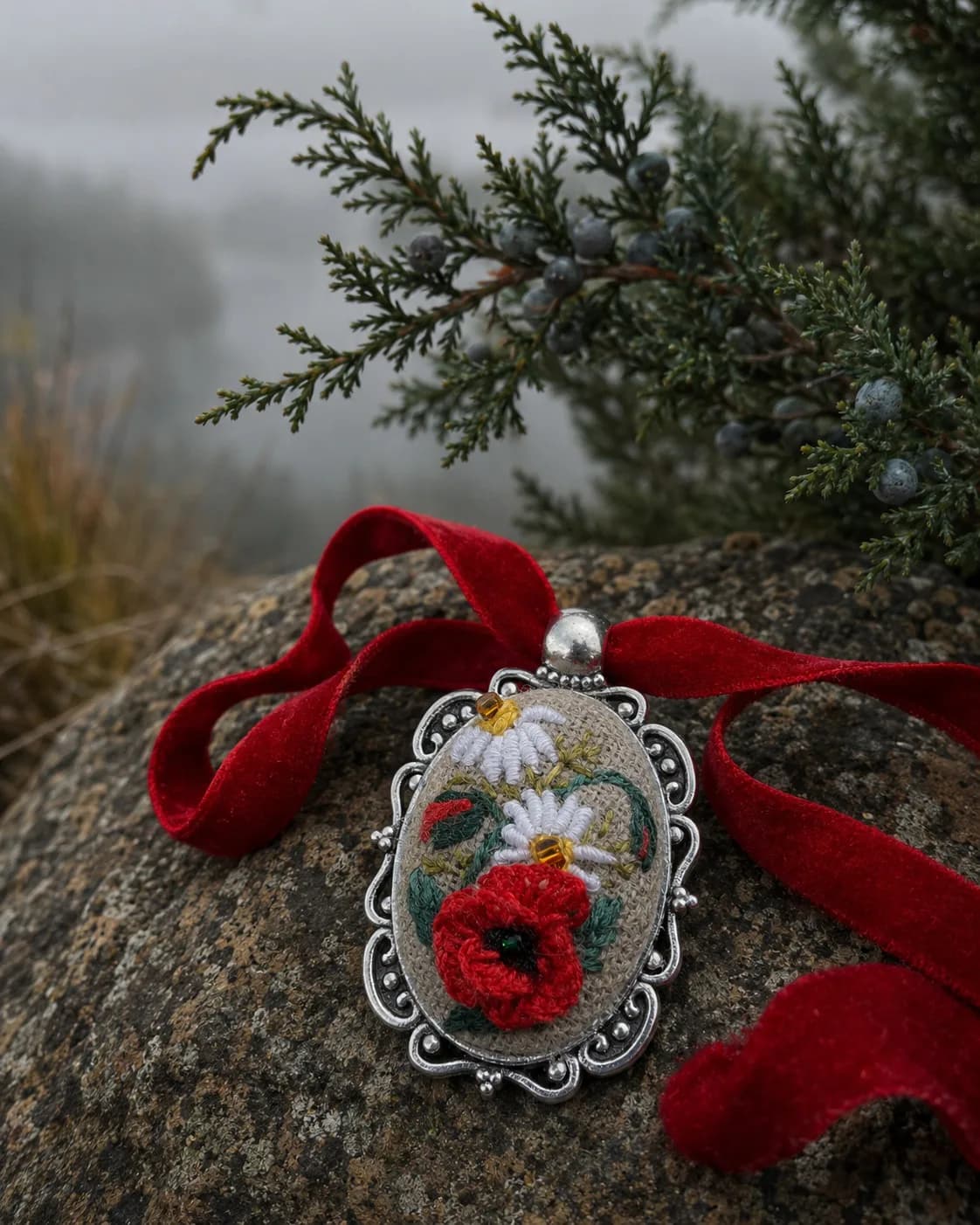 Carpathian Poppy — pendant shown in hand, NataSko Handmade